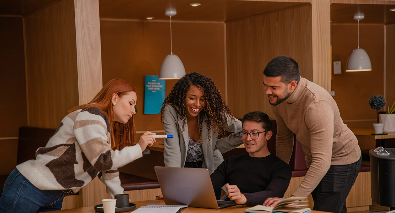 iPhone, top part of screen showing home screen with Weather and Find My widgets in the top row